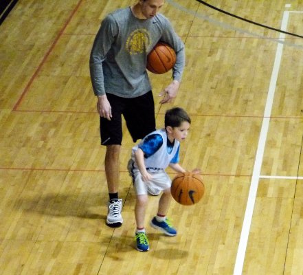 Nick dribbles the ball